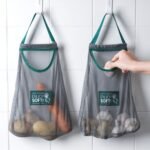 gNEgKitchen Fruit Vegetable Storage Bags Reusable Garlic Onion Hanging Storage Bags Home Organizer Hollow Mesh Bags.jpg